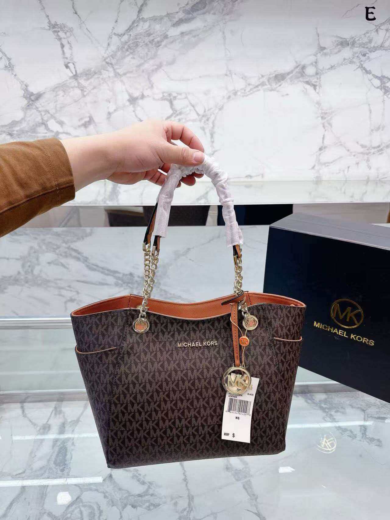 حقيبة سفر مايكل كورس جيت سيت 2 - مراجعة Women'S Bags Of Michael Kors وسعره